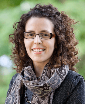 head shot of a smiling woman