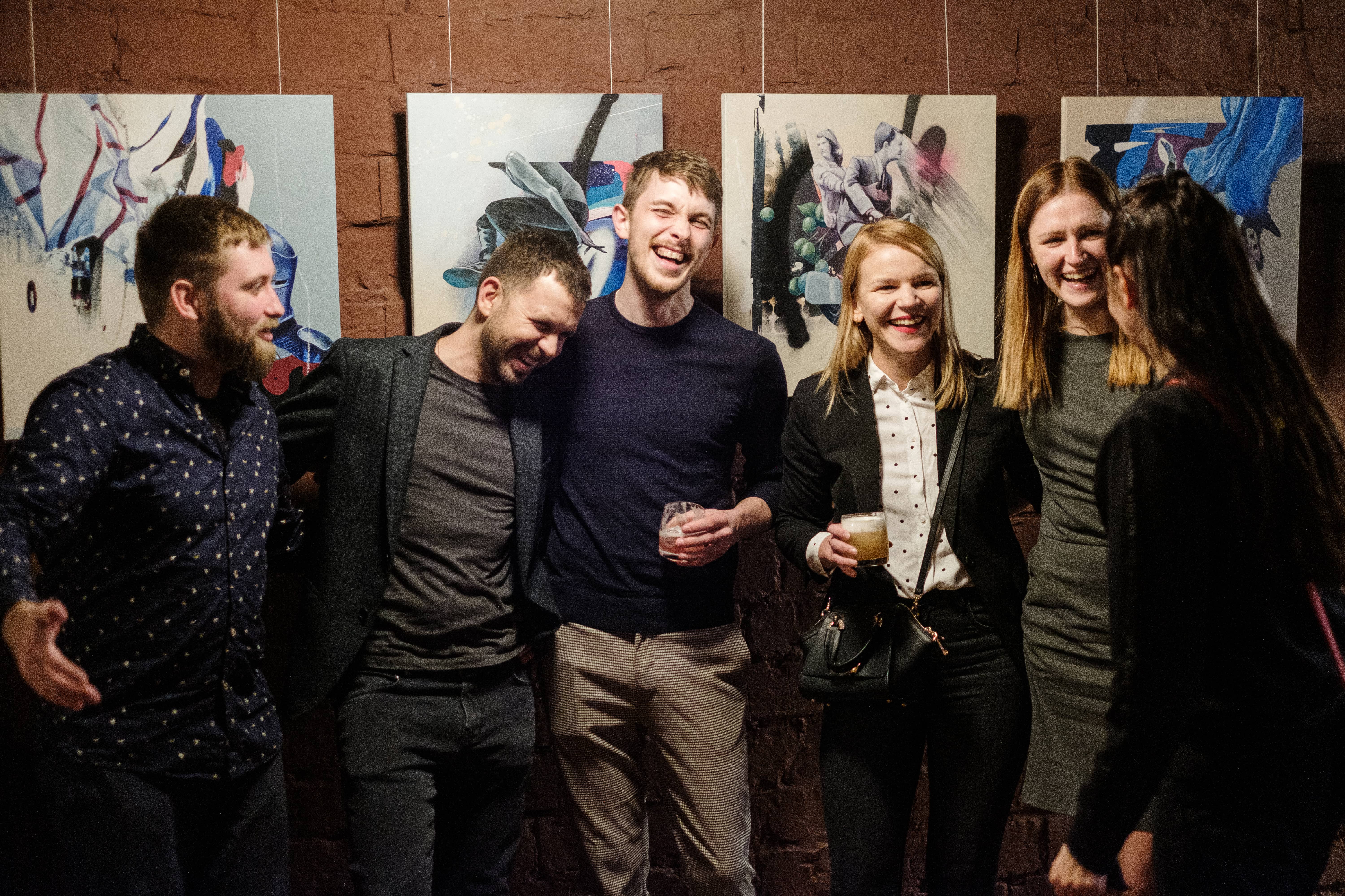 5 Urban Space supporters pose in front of artwork