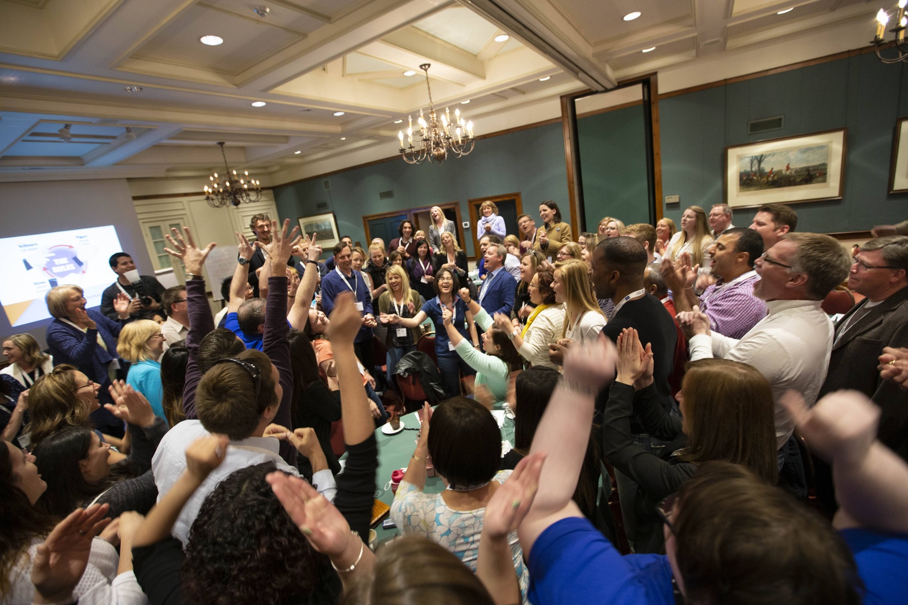 Raise team members participating in a team-building exercise, reflecting the collaborative culture of their self-managing organization. Photo credit: Raise Recruiting